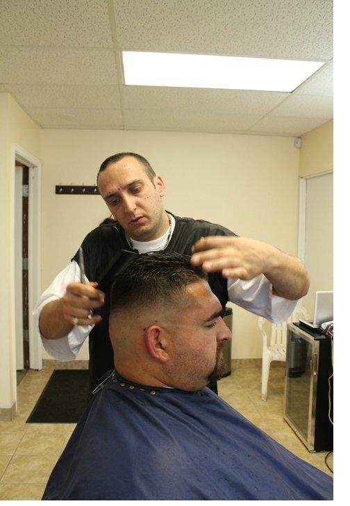 Clean fade haircut at Fade N' Shave barber shop in Aurora CO