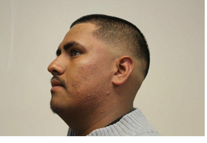 Creative star design haircut by Boris Mataev at Aurora barbershop